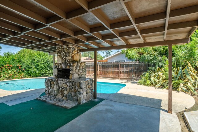 4835 E Normal Ave, Fresno, CA 93703 - view of swimming pool featuring a patio and a fenced backyard