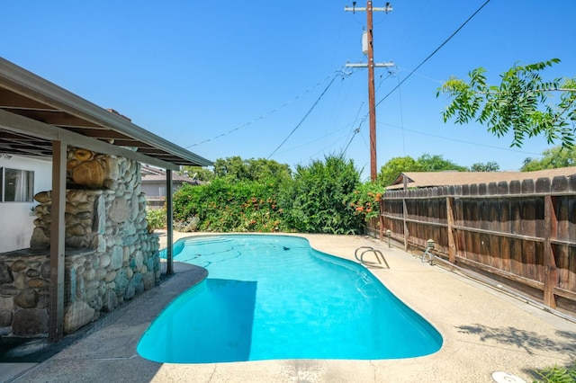 4835 E Normal Ave, Fresno, CA 93703 - view of swimming pool with a fenced backyard