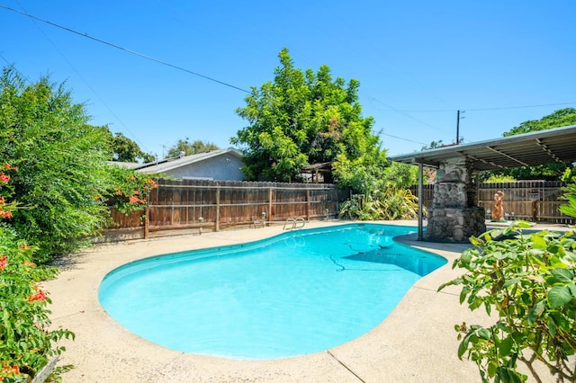 4835 E Normal Ave, Fresno, CA 93703 - view of swimming pool with a fenced backyard