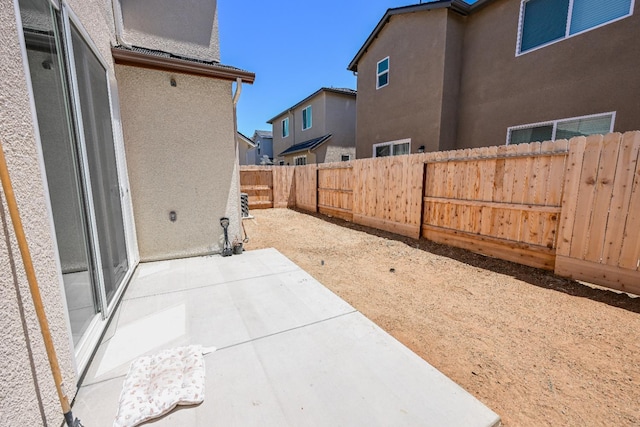 6317 E Malbec Dr, Fresno, CA 93727 - fenced backyard featuring a patio area