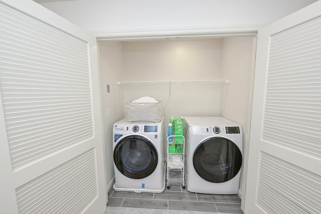 6317 E Malbec Dr, Fresno, CA 93727 - washroom with independent washer and dryer and wood finished floors
