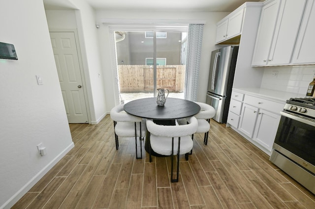 6317 E Malbec Dr, Fresno, CA 93727 - dining space featuring wood finished floors