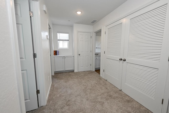 6317 E Malbec Dr, Fresno, CA 93727 - hallway featuring carpet floors and recessed lighting