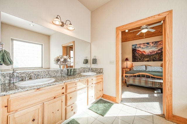 40862 Village Pass Ln, Shaver Lake, CA 93664 - ensuite bathroom featuring tile patterned floors, double vanity, and ceiling fan