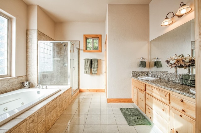 40862 Village Pass Ln, Shaver Lake, CA 93664 - full bathroom with vanity, a stall shower, a jetted tub, tile patterned flooring, and plenty of natural light