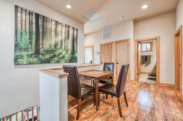 40862 Village Pass Ln, Shaver Lake, CA 93664 - dining area featuring light wood-style flooring and recessed lighting