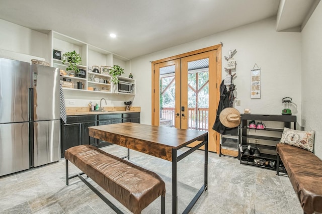 40862 Village Pass Ln, Shaver Lake, CA 93664 - dining area with french doors, stone finish floors, and recessed lighting