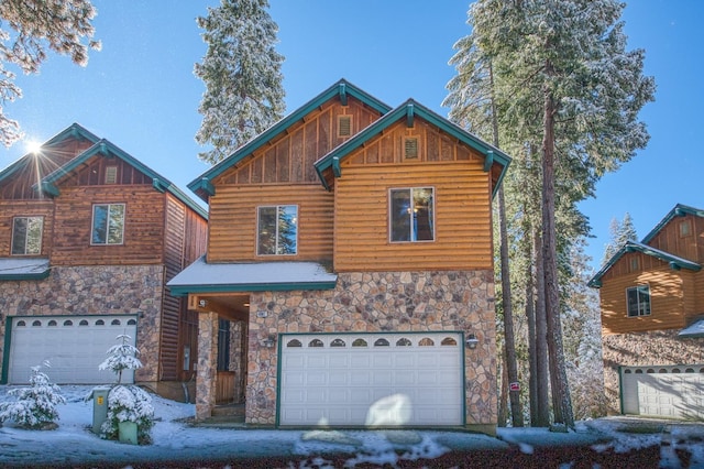 40862 Village Pass Ln, Shaver Lake, CA 93664 - chalet / cabin with stone siding, an attached garage, and board and batten siding