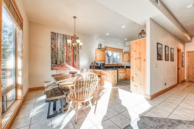40862 Village Pass Ln, Shaver Lake, CA 93664 - dining space with plenty of natural light, a chandelier, light tile patterned flooring, and recessed lighting
