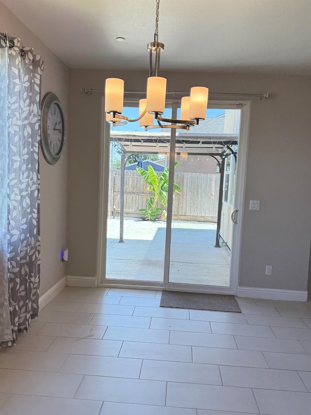 3963 Morris Ave, Clovis, CA 93619 - entryway with a chandelier and tile patterned floors