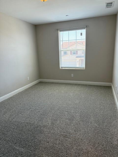 3963 Morris Ave, Clovis, CA 93619 - empty room featuring baseboards and carpet floors