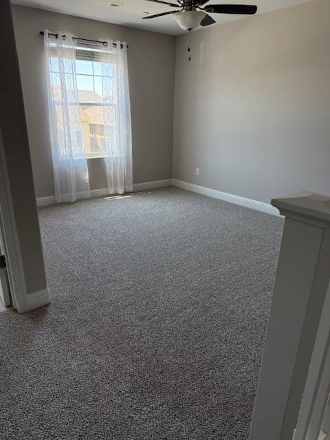 3963 Morris Ave, Clovis, CA 93619 - carpeted spare room featuring ceiling fan and baseboards