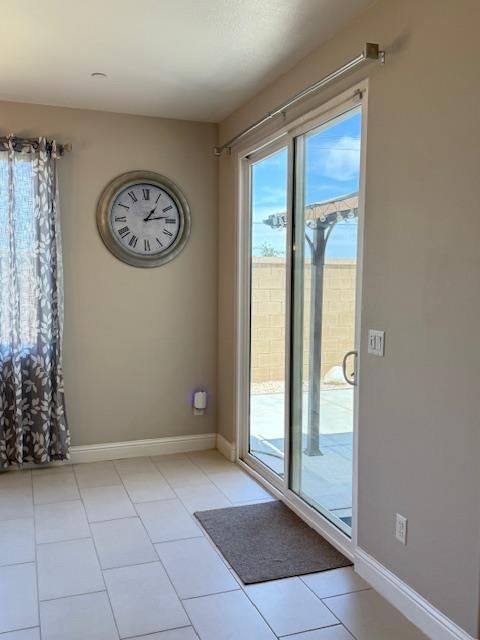 3963 Morris Ave, Clovis, CA 93619 - doorway featuring plenty of natural light and light tile patterned floors