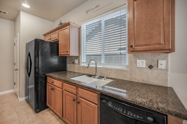 439 W Serena Ave, Clovis, CA 93619 - kitchen with black appliances, decorative backsplash, and light tile patterned floors