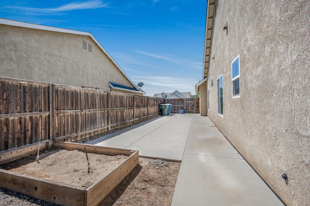 439 W Serena Ave, Clovis, CA 93619 - fenced backyard featuring a patio area