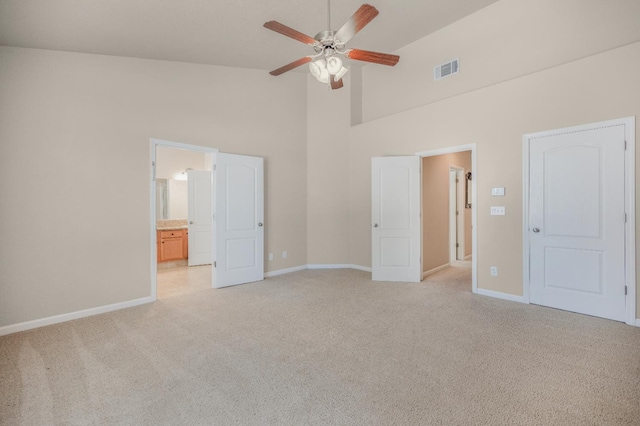 439 W Serena Ave, Clovis, CA 93619 - unfurnished bedroom with light carpet, high vaulted ceiling, ensuite bathroom, and ceiling fan