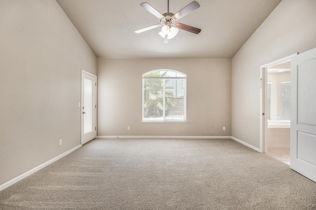 439 W Serena Ave, Clovis, CA 93619 - carpeted empty room with a ceiling fan and vaulted ceiling