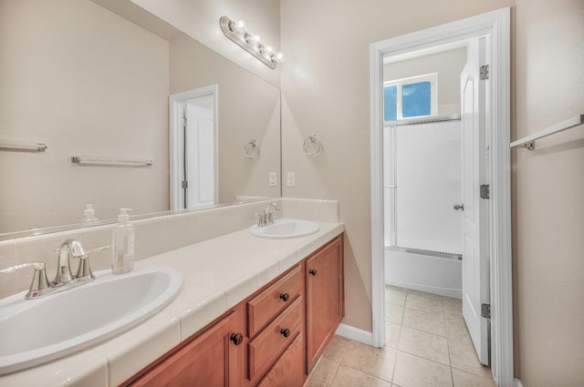 439 W Serena Ave, Clovis, CA 93619 - bathroom featuring double vanity and tile patterned floors