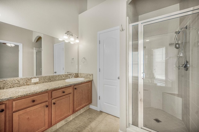 439 W Serena Ave, Clovis, CA 93619 - bathroom featuring a stall shower, vanity, and tile patterned floors