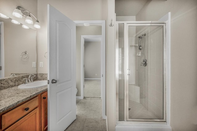 439 W Serena Ave, Clovis, CA 93619 - full bath featuring a shower stall, vanity, and tile patterned floors