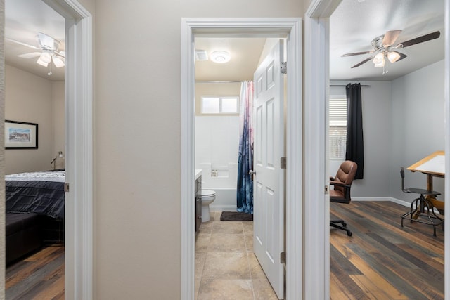 3143 Celeste Ave, Clovis, CA 93619 - corridor with an office area and light wood-style flooring