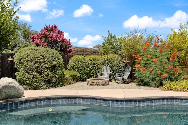 3143 Celeste Ave, Clovis, CA 93619 - view of pool with a fire pit and a patio