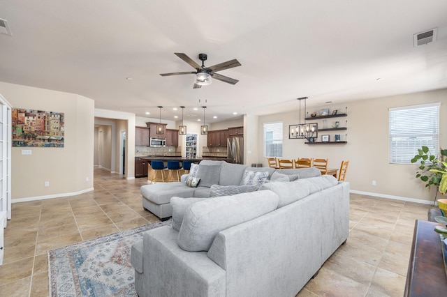 3143 Celeste Ave, Clovis, CA 93619 - living room featuring a ceiling fan, healthy amount of natural light, recessed lighting, and light tile patterned floors