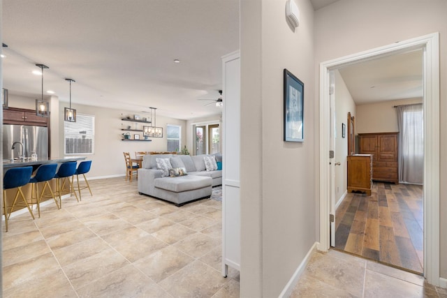 3143 Celeste Ave, Clovis, CA 93619 - corridor featuring light tile patterned floors and recessed lighting