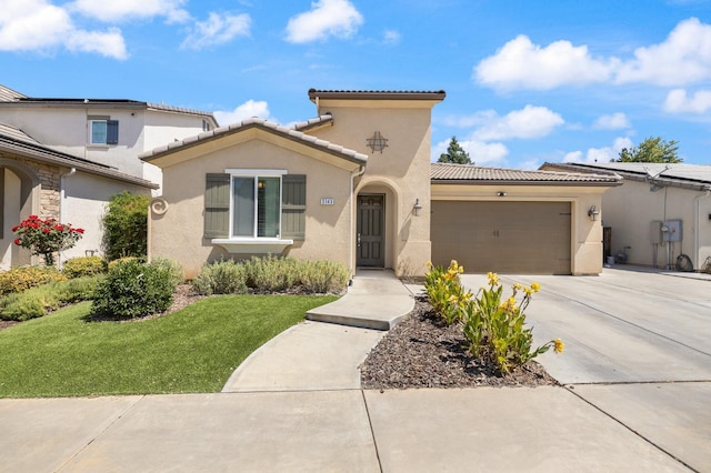 3143 Celeste Ave, Clovis, CA 93619 - mediterranean / spanish-style home with stucco siding, an attached garage, concrete driveway, a front yard, and a tiled roof