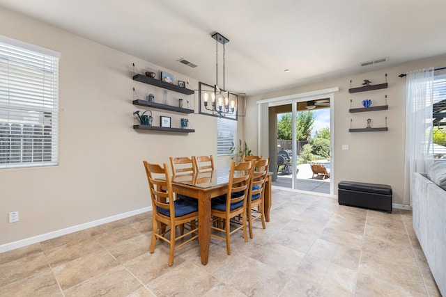 3143 Celeste Ave, Clovis, CA 93619 - dining room with a chandelier and ceiling fan