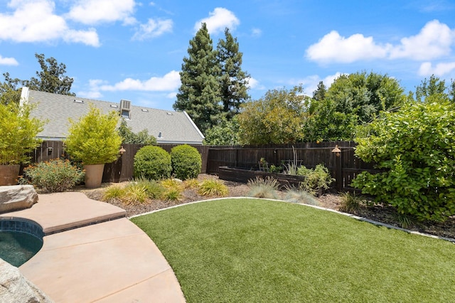 3143 Celeste Ave, Clovis, CA 93619 - fenced backyard featuring a patio area