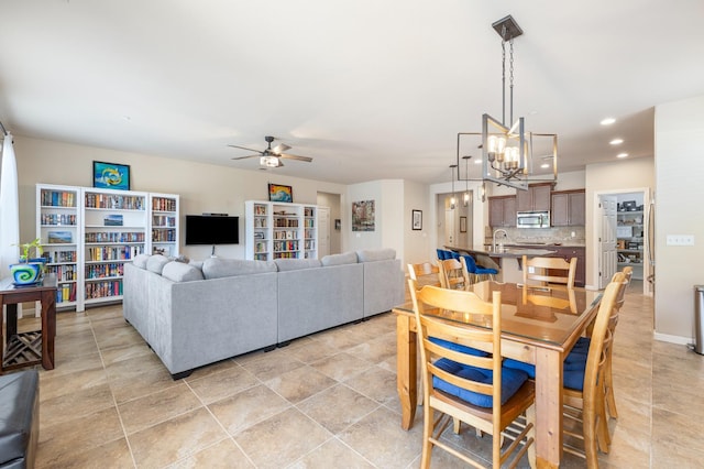 3143 Celeste Ave, Clovis, CA 93619 - dining space featuring ceiling fan, a chandelier, recessed lighting, and light tile patterned floors