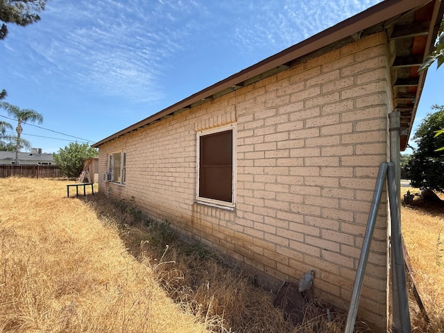 5561 E Indianapolis Ave, Fresno, CA 93727 - view of side of home with brick siding