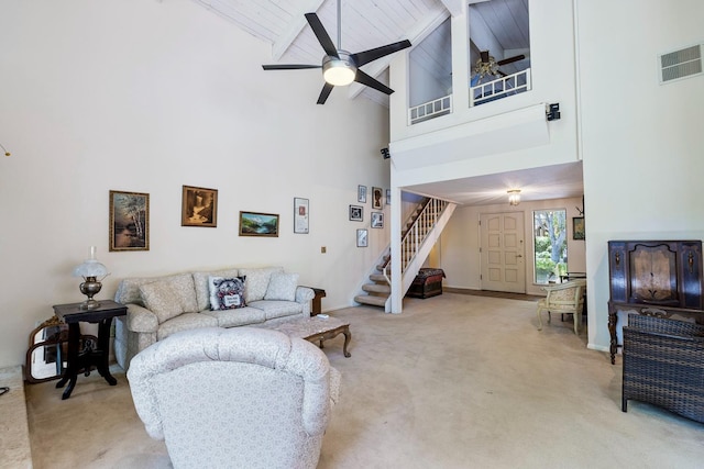 5630 N El Adobe Dr, Fresno, CA 93711 - living area with carpet flooring, stairs, high vaulted ceiling, a wood ceiling with exposed beams, and a ceiling fan