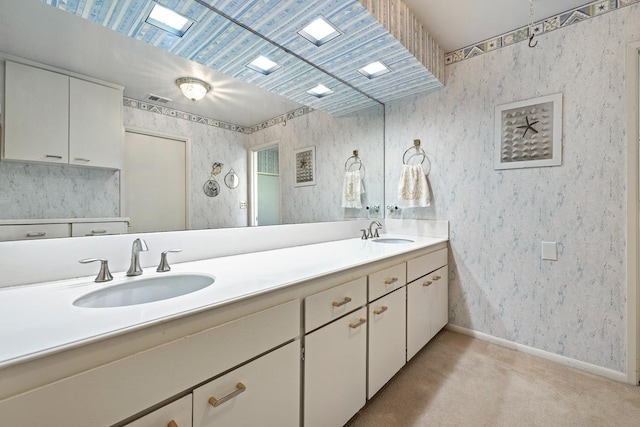 5630 N El Adobe Dr, Fresno, CA 93711 - full bath with double vanity and wallpapered walls
