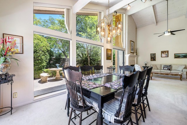 5630 N El Adobe Dr, Fresno, CA 93711 - carpeted dining space with high vaulted ceiling, a chandelier, a ceiling fan, and a wood ceiling with exposed beams