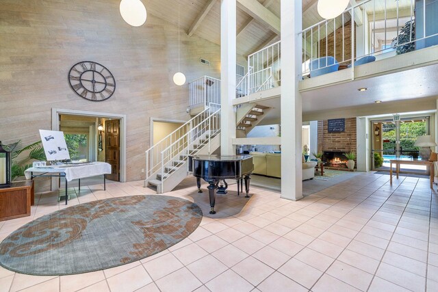 5630 N El Adobe Dr, Fresno, CA 93711 - lobby with high vaulted ceiling, stairs, and a wooden ceiling with exposed beams