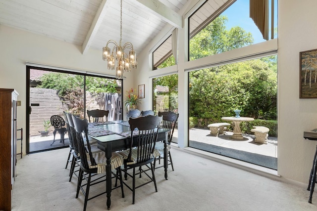 5630 N El Adobe Dr, Fresno, CA 93711 - carpeted dining area with a chandelier, high vaulted ceiling, and a wooden ceiling with exposed beams