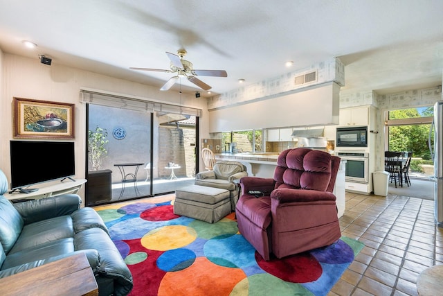 5630 N El Adobe Dr, Fresno, CA 93711 - living room with ceiling fan and light tile patterned floors