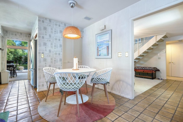 5630 N El Adobe Dr, Fresno, CA 93711 - dining space with stairway and light tile patterned floors