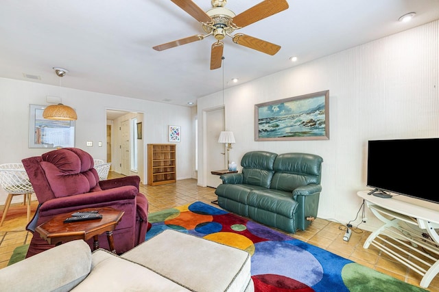 5630 N El Adobe Dr, Fresno, CA 93711 - tiled living room with a ceiling fan and recessed lighting