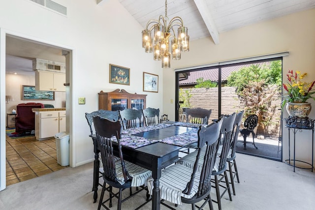 5630 N El Adobe Dr, Fresno, CA 93711 - dining space with light carpet, a chandelier, and wood ceiling