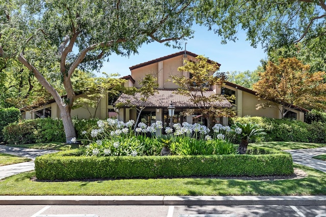 5630 N El Adobe Dr, Fresno, CA 93711 - view of front of house with a tiled roof and stucco siding
