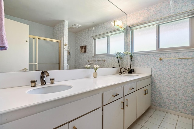 5630 N El Adobe Dr, Fresno, CA 93711 - bathroom with double vanity, a stall shower, tile patterned floors, and wallpapered walls