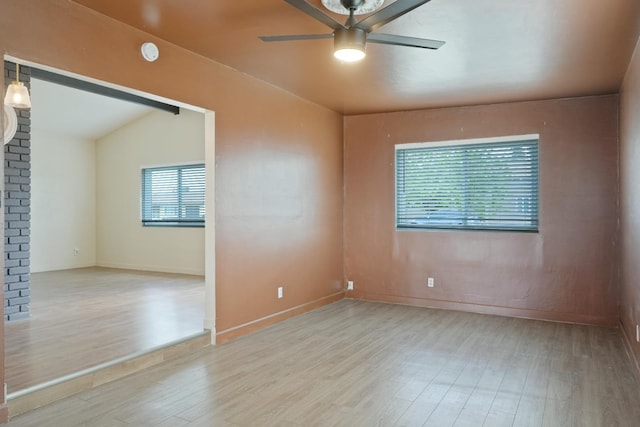 1016 N White, Hanford, CA 93230 - spare room featuring wood finished floors, a ceiling fan, and a smoke detector