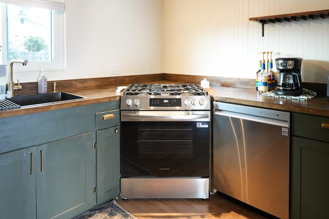 1016 N White, Hanford, CA 93230 - kitchen with stainless steel appliances and dark wood-type flooring