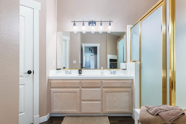 8194 N 5th St, Fresno, CA 93720 - bathroom with double vanity, wood finished floors, and an enclosed shower