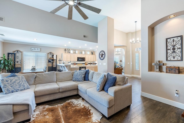 8194 N 5th St, Fresno, CA 93720 - living area featuring a chandelier, a ceiling fan, dark wood-style flooring, recessed lighting, and arched walkways
