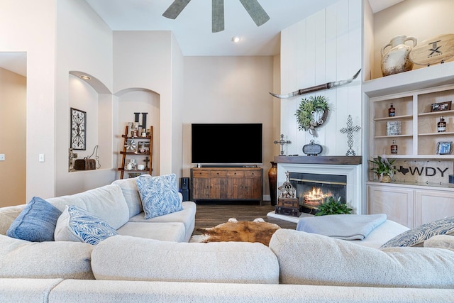8194 N 5th St, Fresno, CA 93720 - living room with dark wood-type flooring, ceiling fan, and a glass covered fireplace