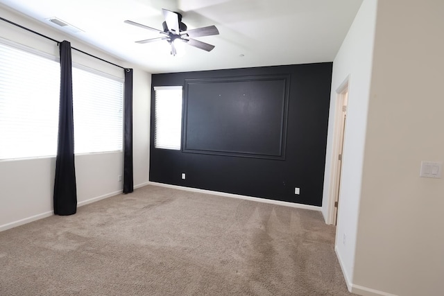 879 Hermosa Ave, Clovis, CA 93619 - spare room featuring a ceiling fan and carpet floors